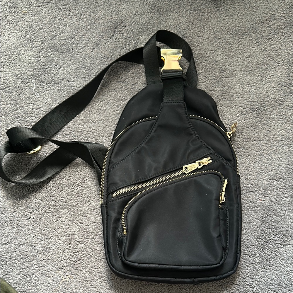 Sol and Selene Black Sling Bag with Gold Accents